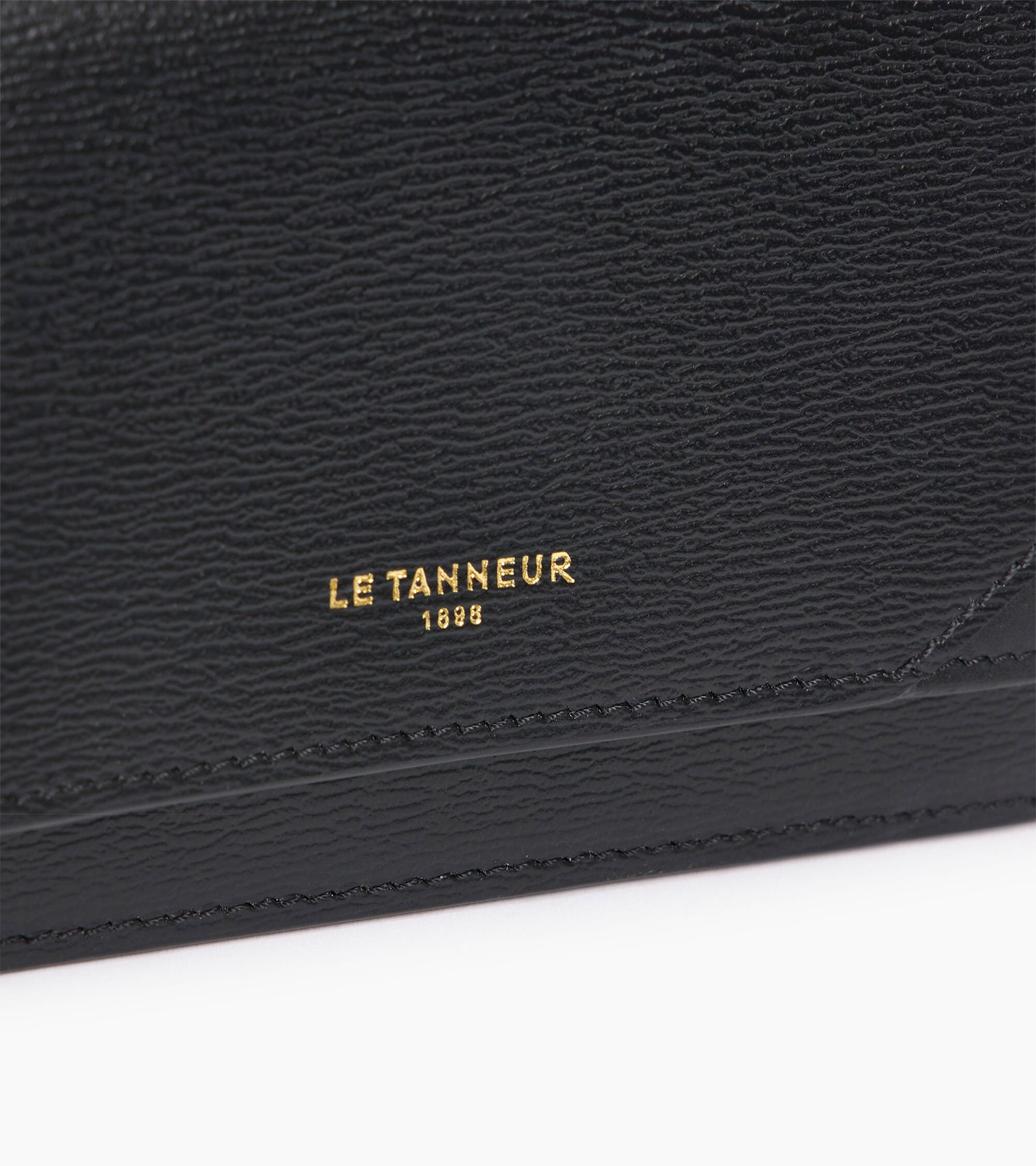 Tarjetero con solapa Naya en piel vuelta